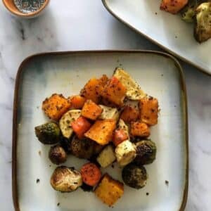 herb roasted vegetables on a plate.