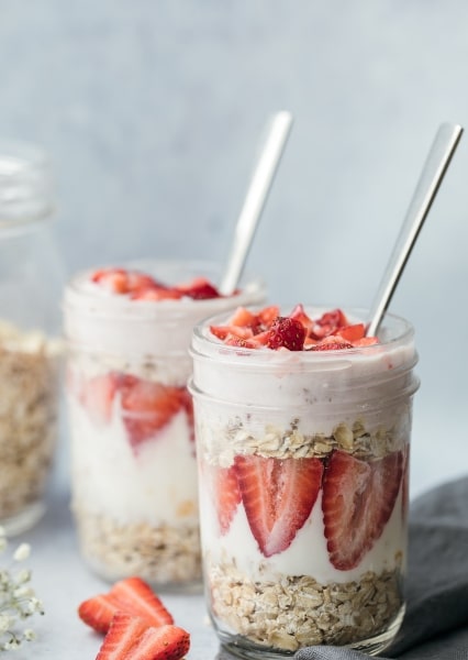 Healthy breakfast idea overnight oats with strawberries and yogurt