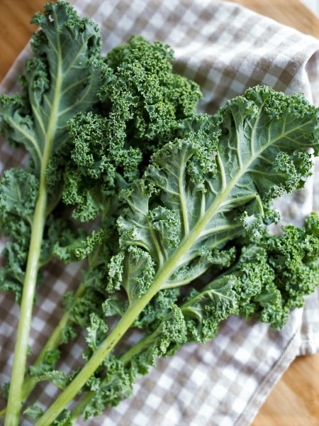 Kale leaves, a nutrient-dense food, on a napkin