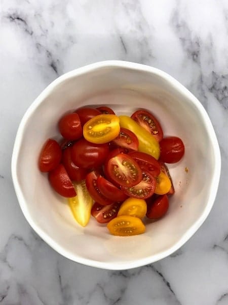 bowl of sliced grape tomatoes