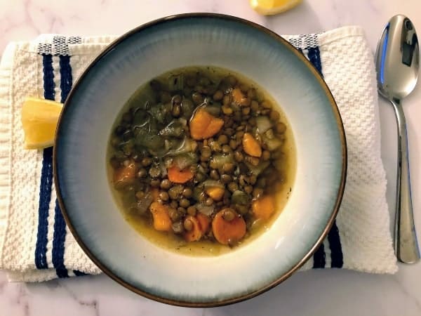 lentil soup with vegetables in a bowl.