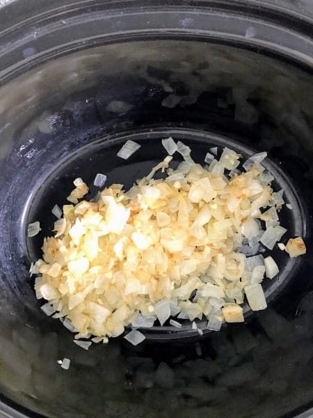 Chopped onions sautéed and added to slow cooker