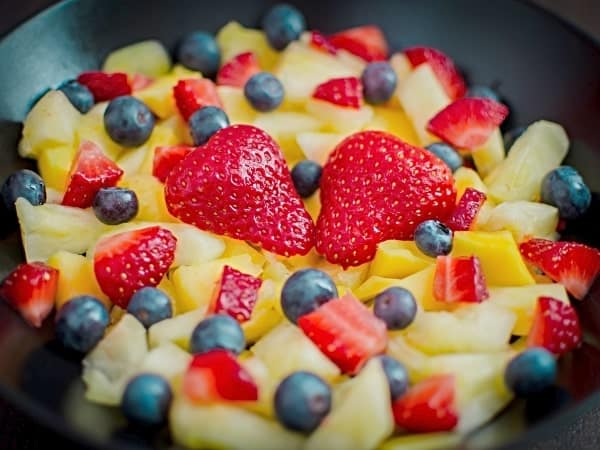 fruit salad with strawberries, blueberries, pineapple