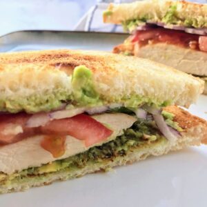 chicken avocado sandwich on sourdough bread