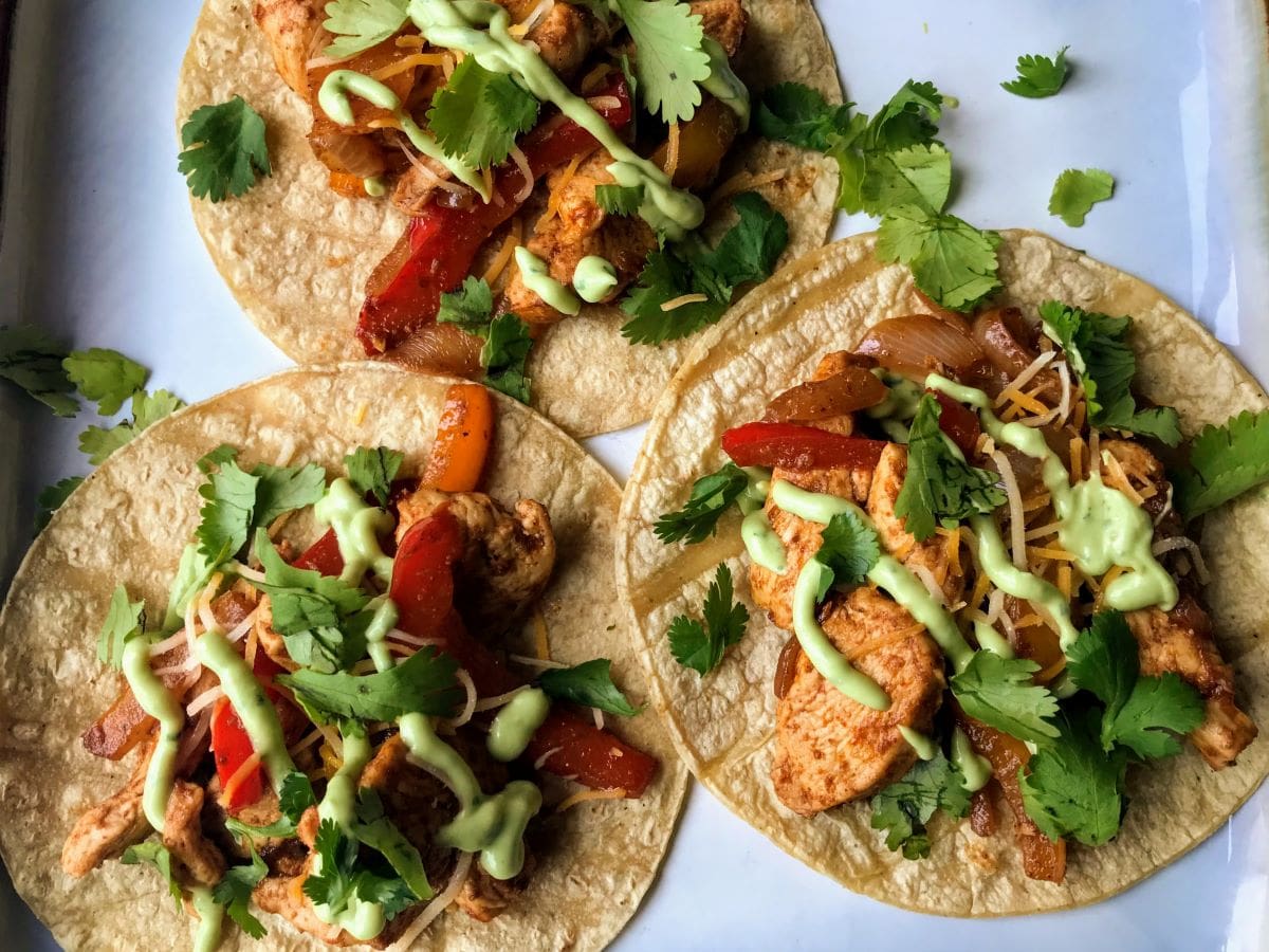 chicken fajita tacos with chopped cilantro