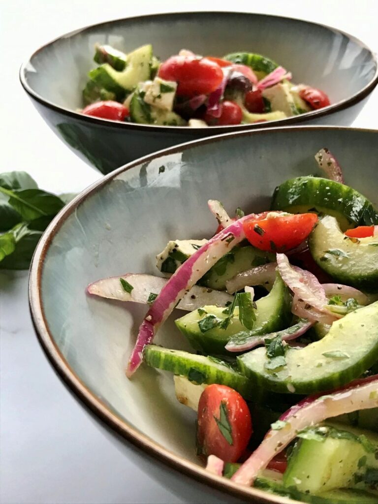 Two bowls of Greek peasant salad.