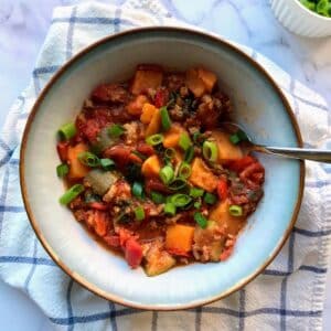 Low FODMAP turkey chili with sweet potatoes in a bowl.